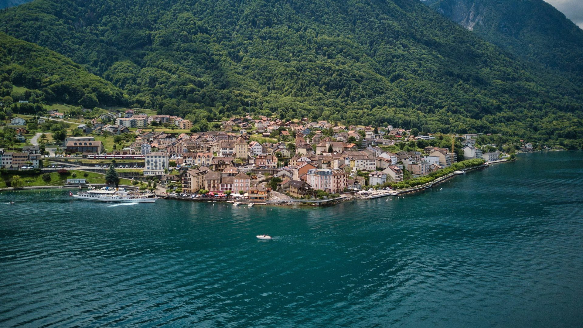 an aerial view of a small town on a small island